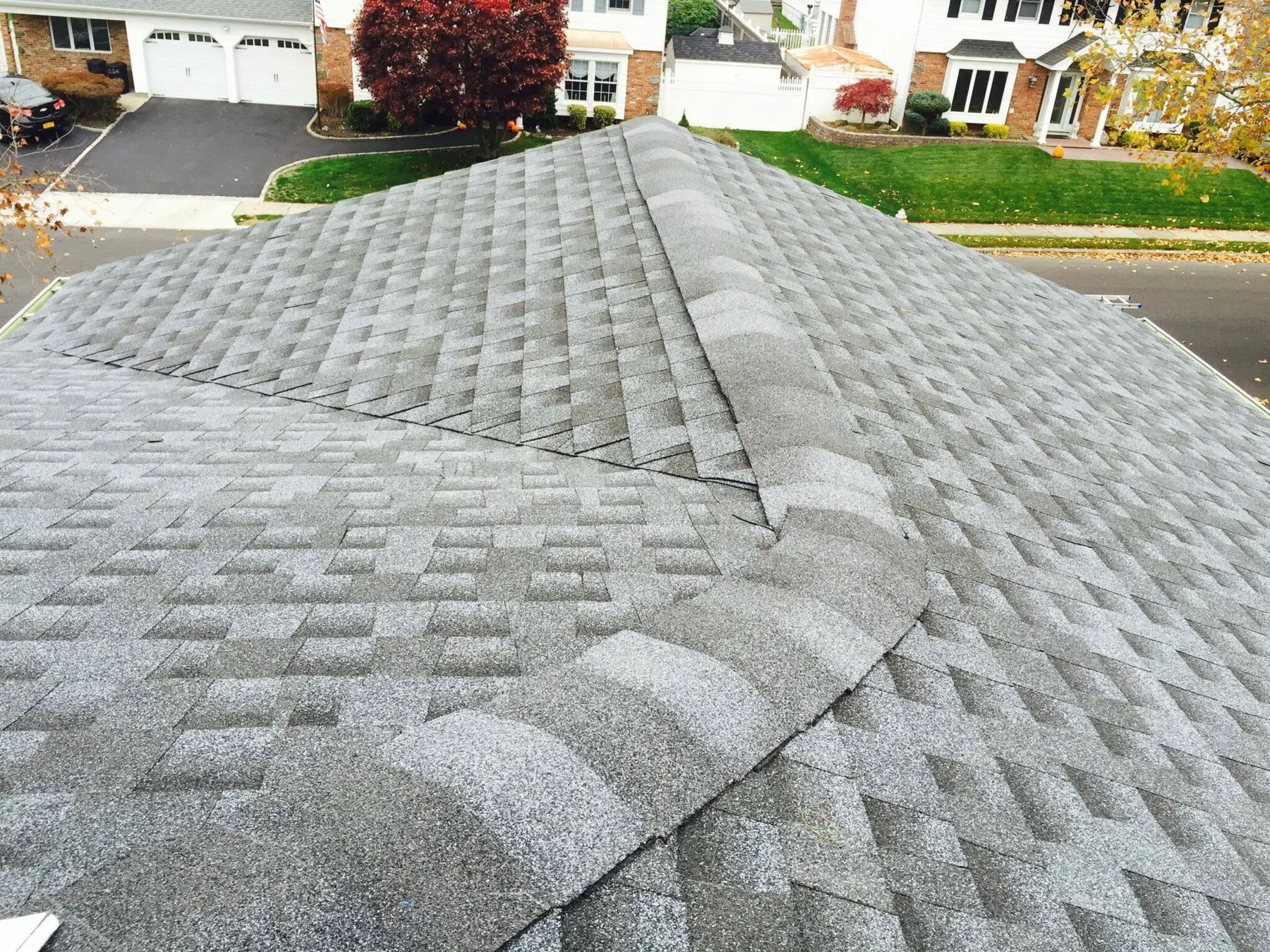 Completed residential shingle roof installation
